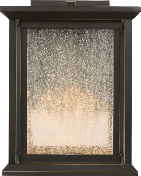 The Audley Small LED Lantern combines energy-efficient integrated LED technology with traditional styling. Its compact scale makes it ideal for narrow entries and side doors, while Dark Sky compliance ensures responsible lighting.