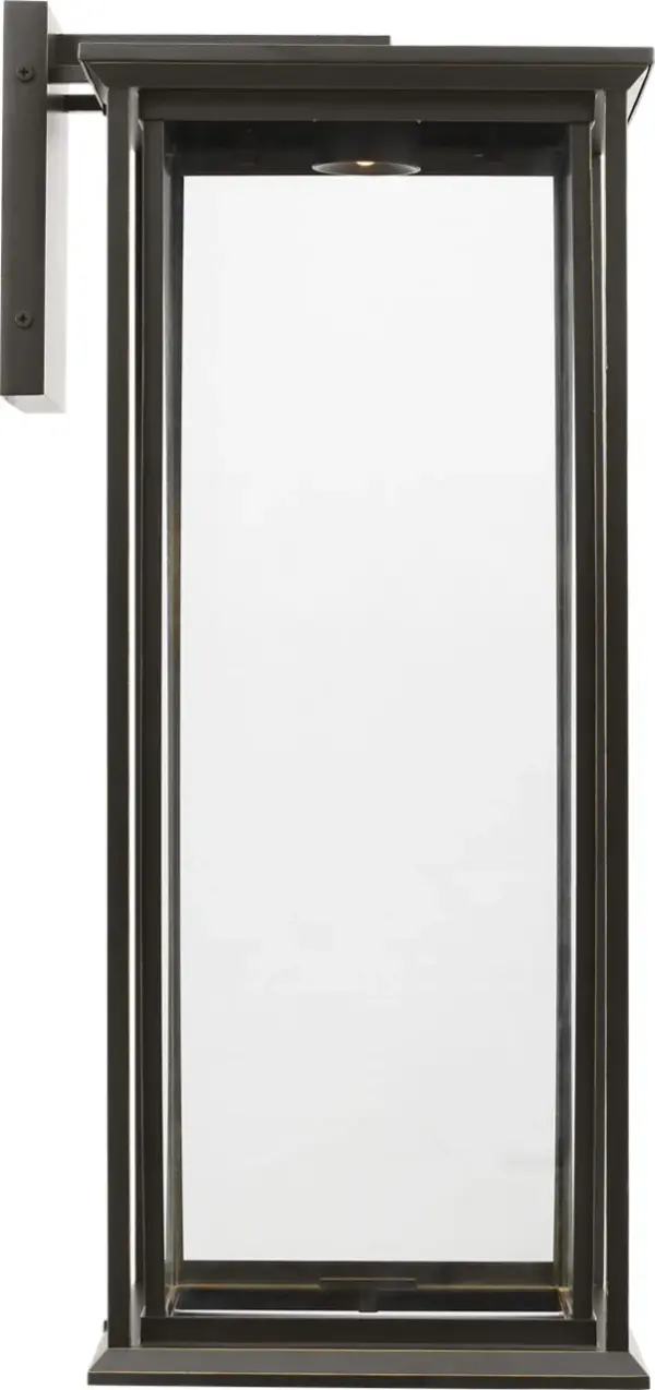 The Audley Extra Large Lantern delivers sophisticated outdoor illumination with integrated LED technology and weather-resistant construction. Clear glass panels provide bright, welcoming light while the antique bronze finish adds classic charm.