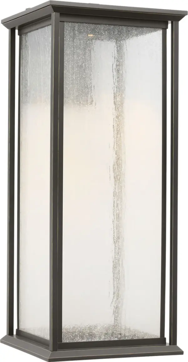 The Audley Extra Large Lantern delivers timeless elegance with modern LED efficiency. Its substantial 24-inch scale and distressed seeded glass create beautiful ambient lighting for grand entrances and outdoor living spaces. - alternate view