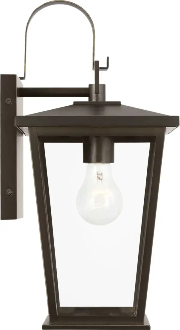 The Linton Medium Lantern delivers understated sophistication with its tapered frame and clear glass enclosure. Perfect for entrances and outdoor sitting areas, it balances traditional design with versatile styling.