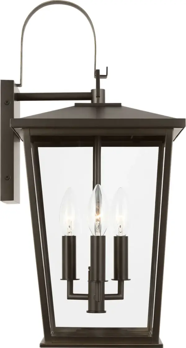 The Linton Large Lantern makes a bold statement with its scaled-up frame and clear glass panels. Perfect for illuminating front entrances, large patios, or commercial facades with classic lantern styling.