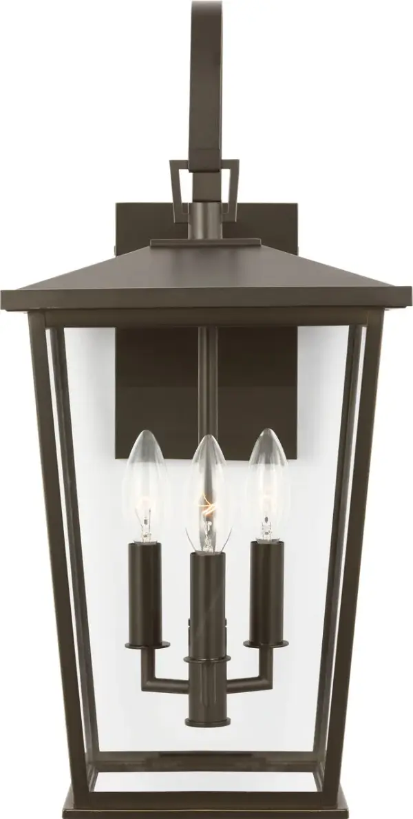 The Linton Large Lantern makes a bold statement with its scaled-up frame and clear glass panels. Perfect for illuminating front entrances, large patios, or commercial facades with classic lantern styling. - alternate view