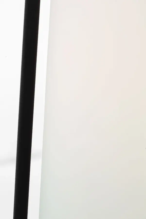 The Luning post lantern combines industrial design with elegant simplicity, featuring a rounded metal frame in Antique Bronze and etched white glass for a soft, welcoming glow. Wet-rated for durability and versatile styling. - alternate view