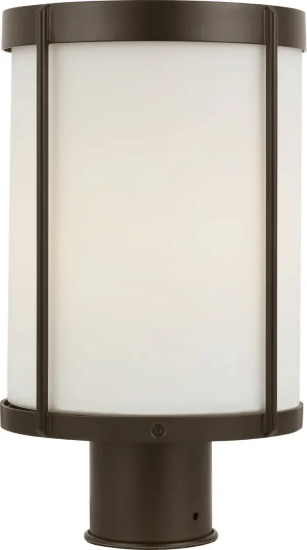 The Luning post lantern combines industrial design with transitional elegance, featuring a rounded metal frame in Antique Bronze and etched white glass for a soft, welcoming glow. Wet-rated for durability and versatile styling. - alternate view