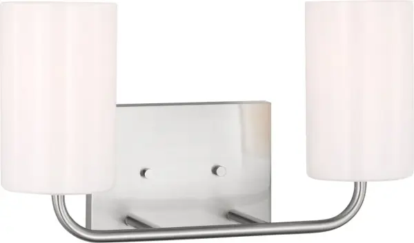 The Rhett Medium Vanity brings modern sophistication to bathroom lighting with its clean lines and simple round globe design. The brushed steel finish offers versatile styling that complements contemporary interiors. - alternate view