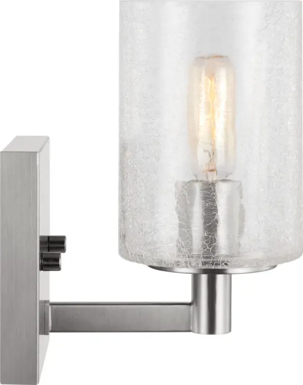 The Parker wall sconce combines clean lines with a classic brushed steel finish, making it ideal for modern bathrooms and transitional spaces. Its compact single-light design provides focused illumination. - alternate view