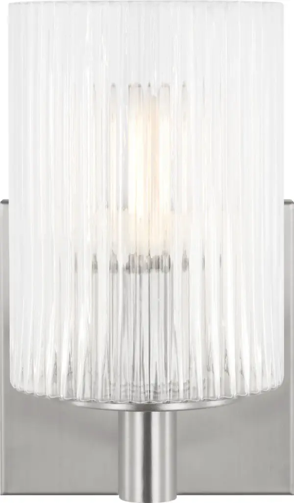 The Lando wall sconce delivers clean, contemporary styling with its brushed steel finish. Ideal for bathroom vanities and hallways, this single-light fixture provides focused illumination with modern appeal.