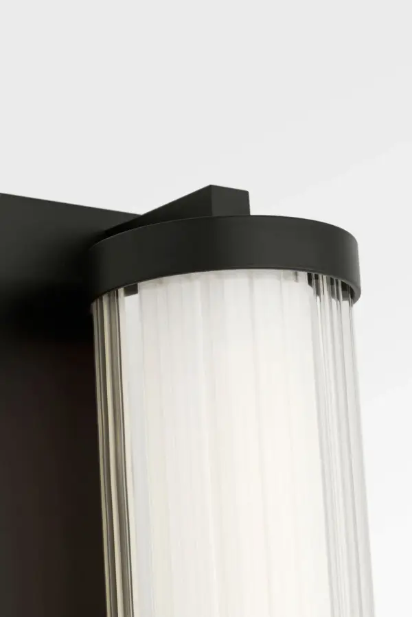 The Weston 28" LED Vanity delivers efficient, glare-free illumination through its ribbed glass lens and full-length metal backplate. Perfect for contemporary bathrooms seeking clean lines and functional lighting. - alternate view