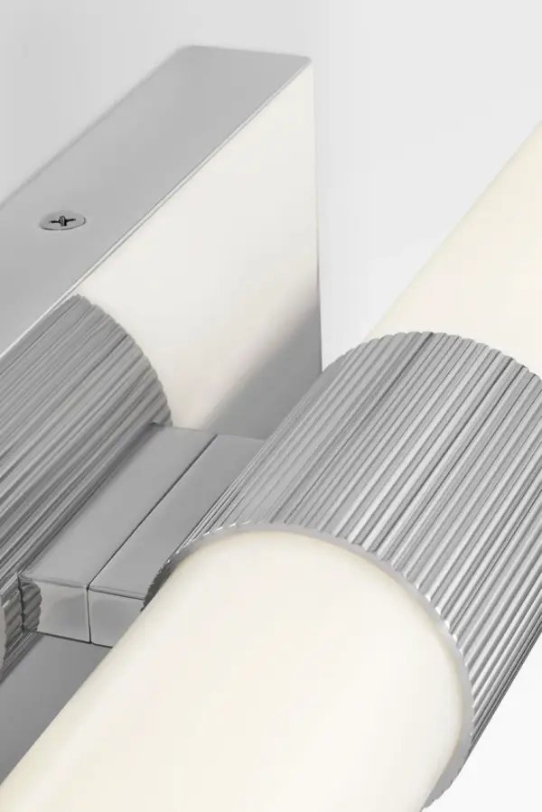 The Sarco 30" LED Vanity brings sculptural presence to bathrooms with its dual-cylinder design and refined band detailing. Chrome finish and integrated LED technology deliver both style and energy efficiency. - alternate view