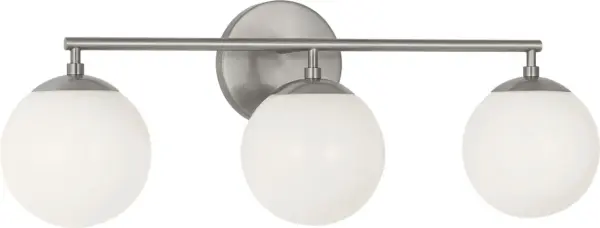 The Nube 3-Light Vanity brings sophisticated bathroom lighting with its distinctive floating milk glass spheres. The brushed nickel finish and horizontal bar design create an airy, modern aesthetic while providing flattering face-level illumination. - alternate view