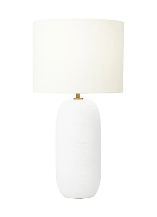 The Fanny table lamp by Hable combines elemental materials with clean lines for a timeless aesthetic. Its matte white ceramic base and white linen shade create a sophisticated, versatile look that complements contemporary and minimalist interiors.