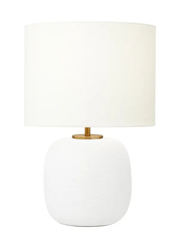 The Fanny table lamp by Hable delivers understated elegance through clean lines and elemental materials. Its matte white ceramic base and white linen shade create a versatile lighting solution that complements contemporary and minimalist interiors.