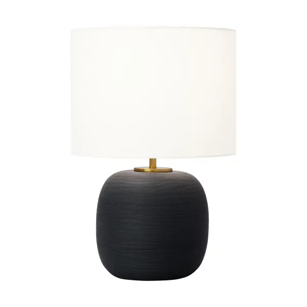 The Fanny table lamp by Hable brings clean-lined sophistication to any space. Its rough black ceramic base and white linen shade create a striking contrast that works in both modern and transitional settings.