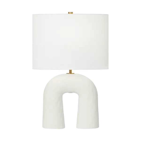 The Aura Small Table Lamp by HABLE combines hand-sculpted ceramic artistry with refined brass accents and a soft linen shade. Its petite size and organic form make it perfect for adding contemporary character to intimate spaces.