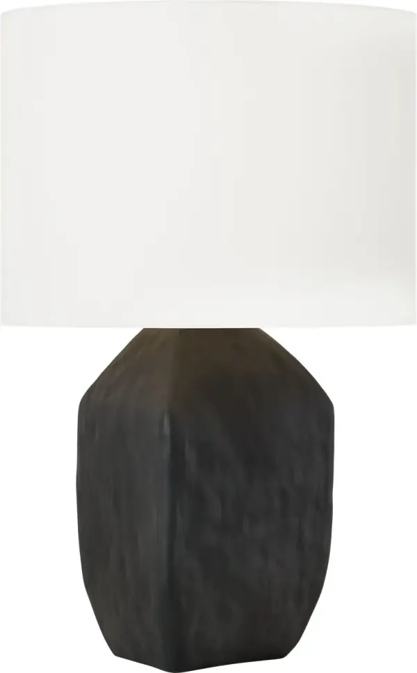 The Sybert Medium Table Lamp combines handcrafted artistry with contemporary design. Its distinctive angular ceramic base and white linen drum shade create sophisticated ambient lighting for modern interiors. - alternate view