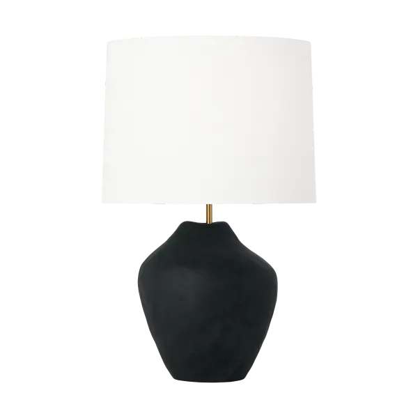 The Cadley Medium Table Lamp by HABLE showcases hand-sculpted ceramic artistry with a rough black finish that adds textural depth and visual interest. Its organic form creates an instant focal point while the classic white linen drum shade provides warm, inviting illumination perfect for contemporary interiors.
