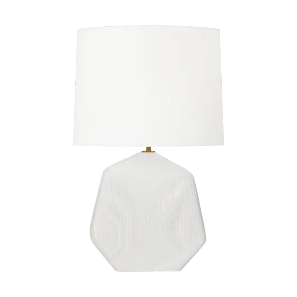 The Tallulah brings artisanal elegance with its hand-etched geometric patterns on matte white ceramic. The sculptural body paired with a soft linen drum shade creates ambient lighting perfect for refined interiors.