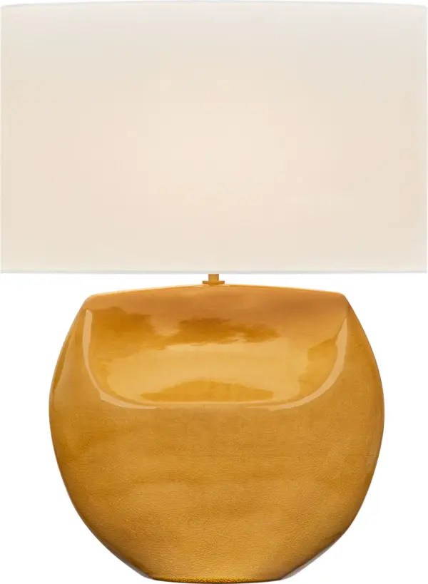 The Pente 27" Table Lamp combines hand-shaped ceramic artistry with a natural linen shade to create a sophisticated focal point. Its rounded dual-facade form catches light beautifully while maintaining quiet luxury.