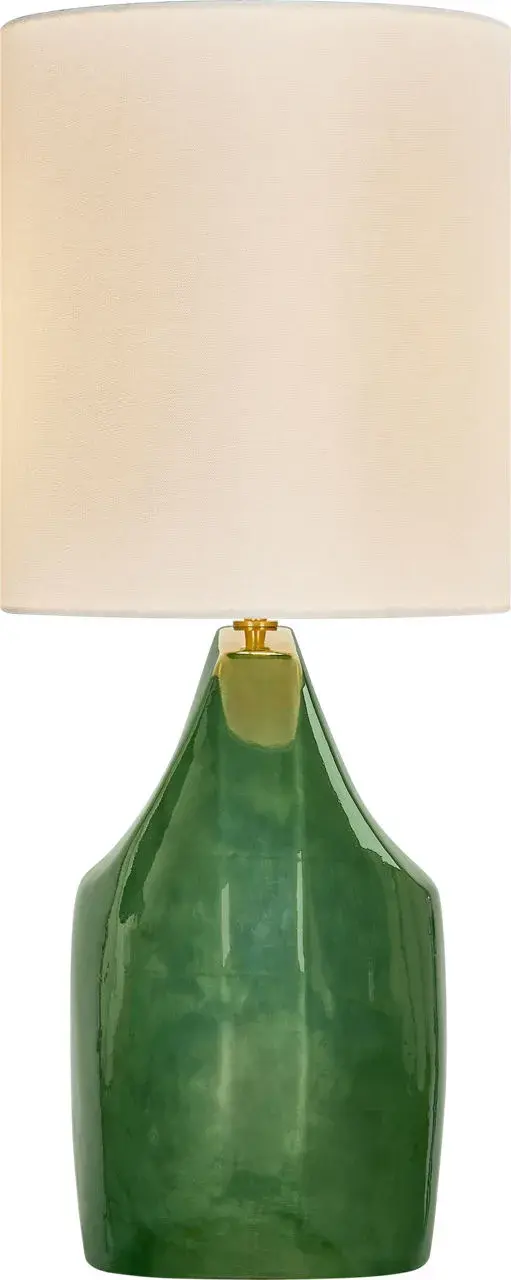The Pente 27" Table Lamp combines hand-shaped ceramic artistry with natural linen softness, creating a sophisticated focal point. Its rounded dual-facade form catches light beautifully while maintaining quiet luxury through expressive materiality. - alternate view