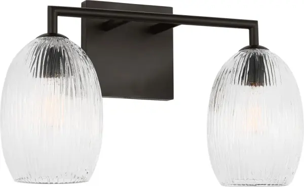The Serafina 16" Bath by Hable combines functional lighting with artistic design. Featuring softly contoured glass pods with hand-carved ceramic-inspired texture, it delivers gentle ambient illumination perfect for bathrooms and intimate spaces.