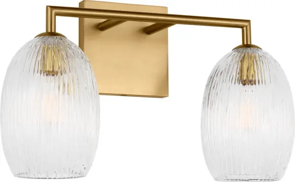 The Serafina 16" Bath brings organic sophistication to vanity lighting with its hand-carved ceramic-inspired glass pods and warm burnished brass finish. Perfect for creating ambient, flattering light in bathrooms and hallways.