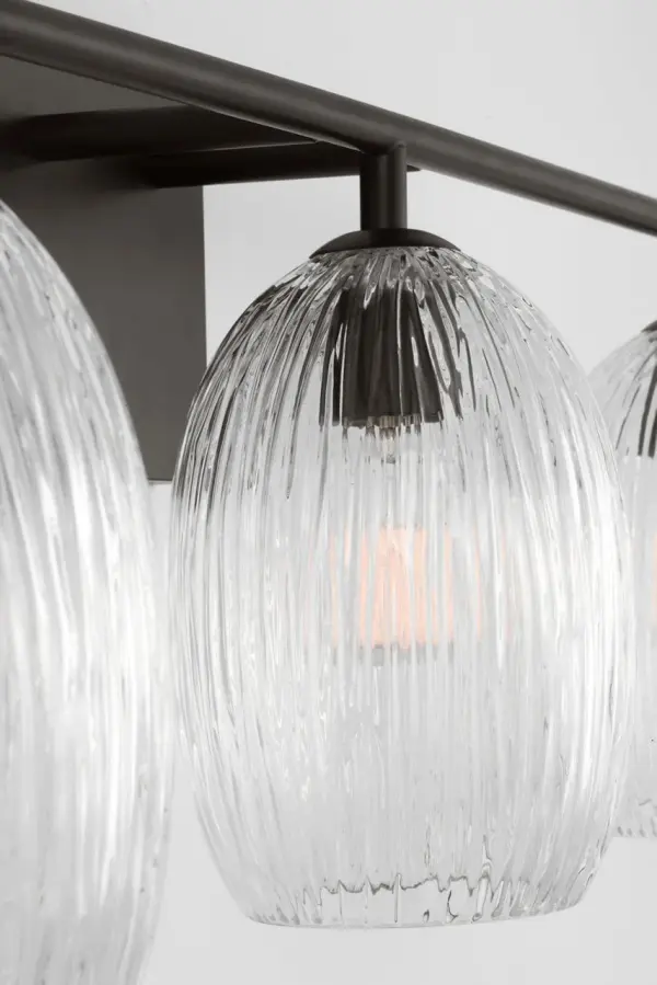 The Serafina 27" Bath Vanity Light brings organic sophistication to any space with its handcrafted combed glass and botanical-inspired forms. Perfect for bathrooms and beyond, it delivers soft ambient lighting with artistic flair. - alternate view