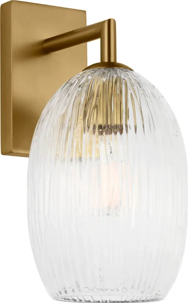 The Serafina 10" Sconce transforms walls into artful statements with its organic silhouette and distinctive combed glass texture. Inspired by handmade ceramics, it delivers ambient lighting with sophisticated warmth.