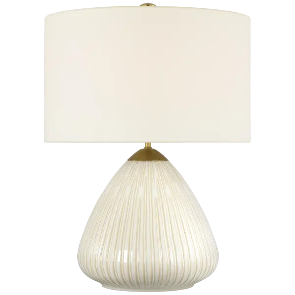 The Vesse table lamp brings organic modern elegance with its sculptural ceramic base in a warm cashew finish. At 28" tall, it provides substantial presence while the natural linen shade softens the light beautifully. - alternate view