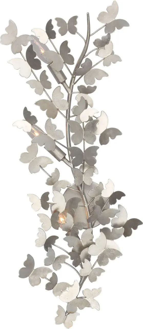 The Farfalle sconce brings artistic sophistication with its 29-inch vertical presence and burnished silver leaf finish. Its directional right-facing design creates dynamic visual interest perfect for flanking mirrors or artwork.
