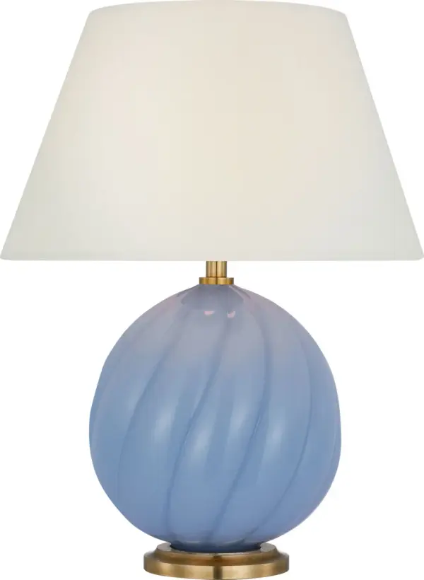 The Talia cordless accent lamp combines artisanal swirled glass orbs with a refined linen shade, offering portable lighting with a feminine, playful touch. Perfect for adding sparkle and flexibility to any space.