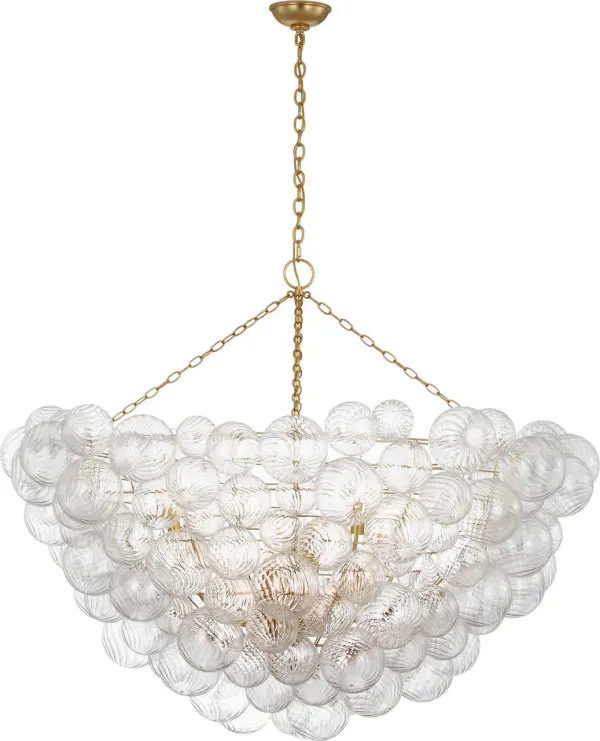 The Talia 56" chandelier by Julie Neill combines artisanal swirled glass orbs with gilded metal baskets for a sophisticated yet playful statement piece. Its generous scale and sparkling glass create dynamic light play perfect for grand spaces. - alternate view