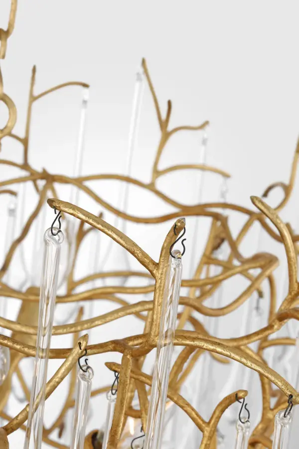 The Rayne 31" Chandelier combines classic elegance with substantial presence. Its gilded iron finish and clear glass elements create a sophisticated focal point perfect for formal dining rooms and grand entryways. - alternate view