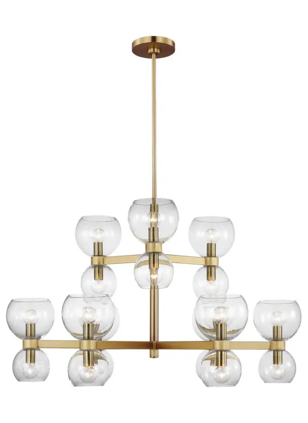 The Londyn chandelier brings kate spade new york's signature playful sophistication to lighting with its geometric arrangement of 18 blown glass globes in two sizes. The burnished brass finish and clear glass create a warm, inviting glow perfect for entertaining spaces.
