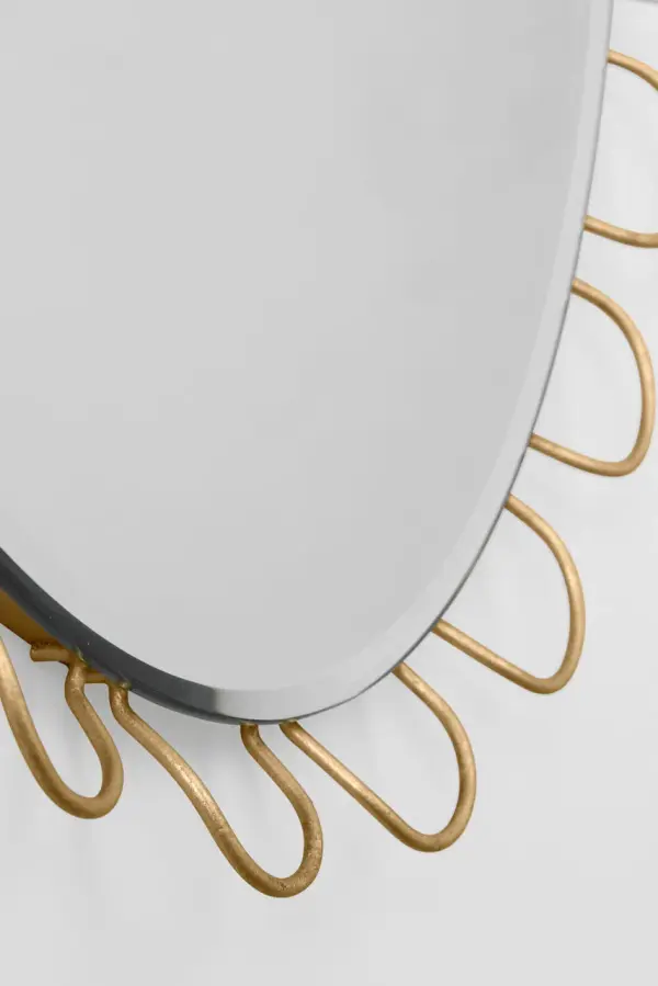 The Tirreno oval mirror brings timeless elegance with its gilded frame and classic proportions. Perfect for bathrooms and powder rooms, this 24" x 31" mirror adds a touch of sophistication to any space. - alternate view