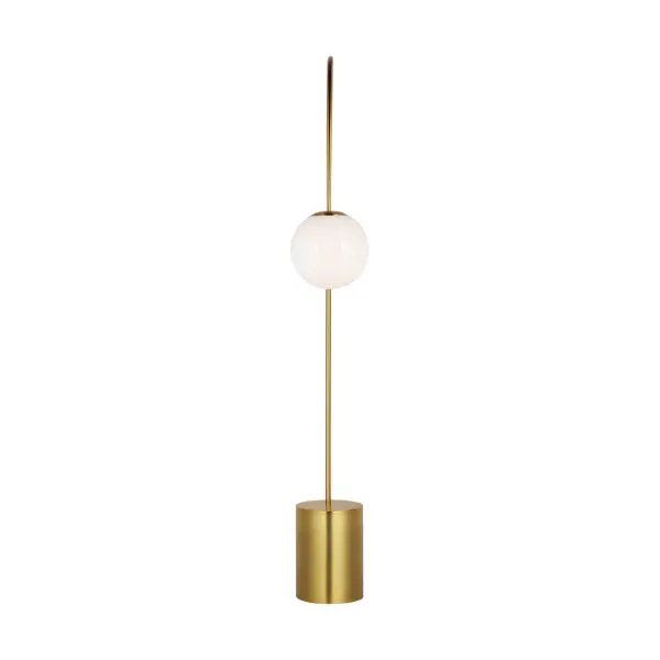 The Noemie Extra Large Floor Lamp combines bold architectural design with luxurious burnished brass finish and a distinctive milk glass orb. Its arching arm and substantial base create dramatic visual interest while providing warm, diffused ambient lighting perfect for modern and art deco-inspired interiors. - alternate view