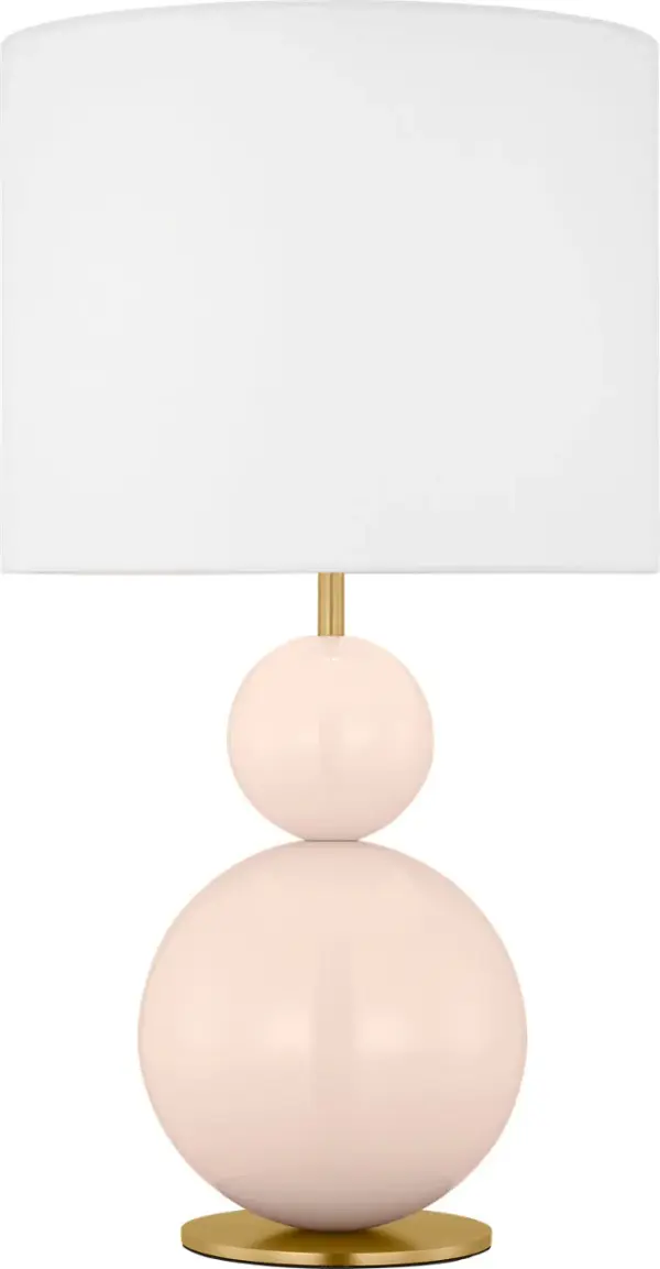 The Suki Medium Table Lamp by kate spade new york transforms minimalist design with its elegant stacked geometric forms and striking Blush finish. Perfect for adding artistic sophistication to bedrooms, living spaces, or offices.