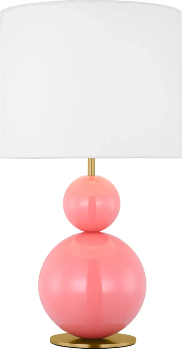 The Suki Medium Table Lamp reimagines minimalism with stacked geometric metal shapes in a striking Coral finish. Its sculptural design and white linen drum shade create a statement piece that balances artistic flair with timeless sophistication.