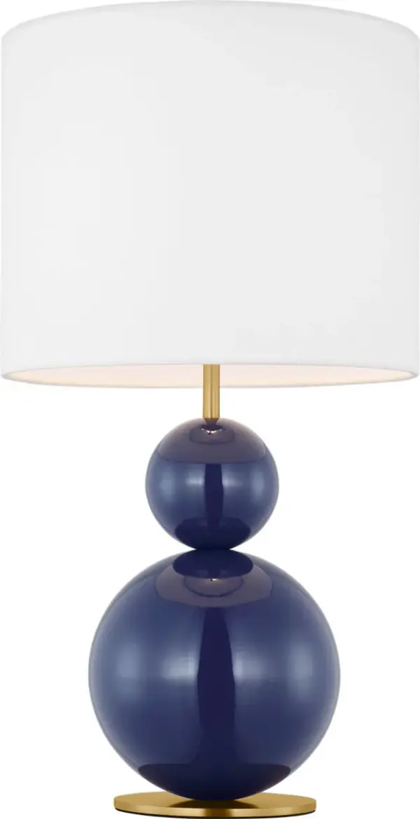 The Suki Medium Table Lamp by kate spade new york transforms minimalism into art with its stacked geometric metal forms and striking navy finish. The white linen drum shade softens light beautifully while clean lines create timeless sophistication. - alternate view
