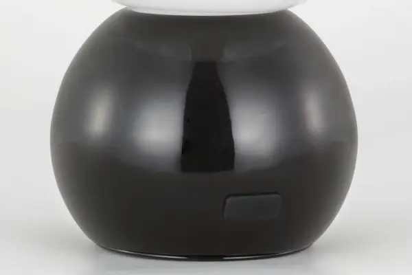 The Suki by kate spade new york combines minimalist elegance with modern convenience. Its sculptural base and milk glass globe deliver soft, warm lighting while USB-C charging eliminates cord clutter. - alternate view