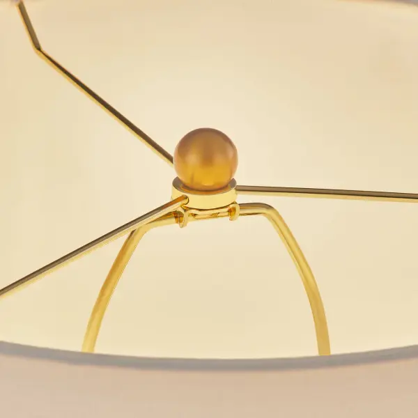 The Lauren 26" table lamp combines classic ceramic craftsmanship with contemporary styling. Its substantial black ceramic base provides visual weight and sophistication, making it ideal for traditional and modern interiors alike. - alternate view