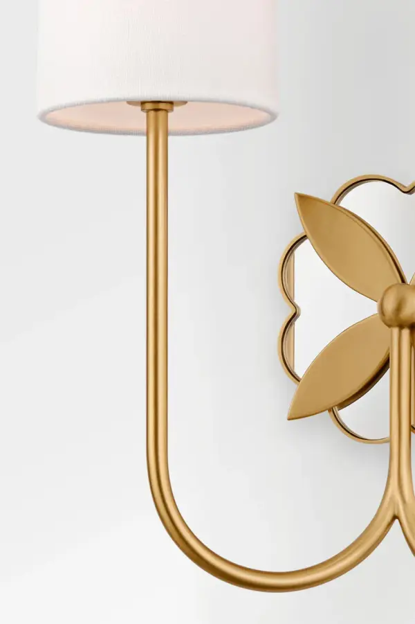 The Spencer Double Sconce combines classic design with contemporary appeal. Its 13-inch width and burnished brass finish add warmth and sophistication to any space, making it ideal for bathroom vanities and hallways. - alternate view