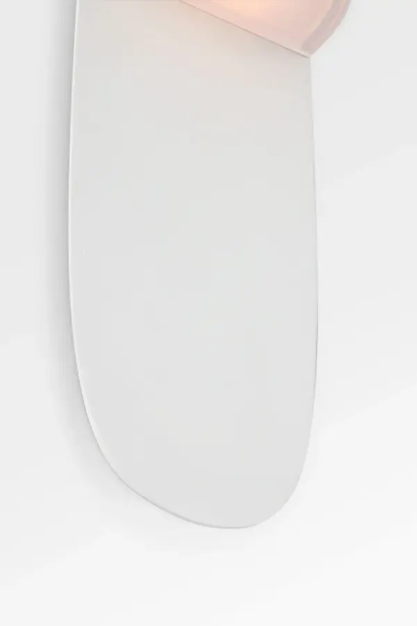 The Axel 16" Sconce delivers modern sophistication with its matte white finish and clean lines. Perfect for bathrooms, hallways, and bedrooms, this fixture provides functional lighting with contemporary style. - alternate view