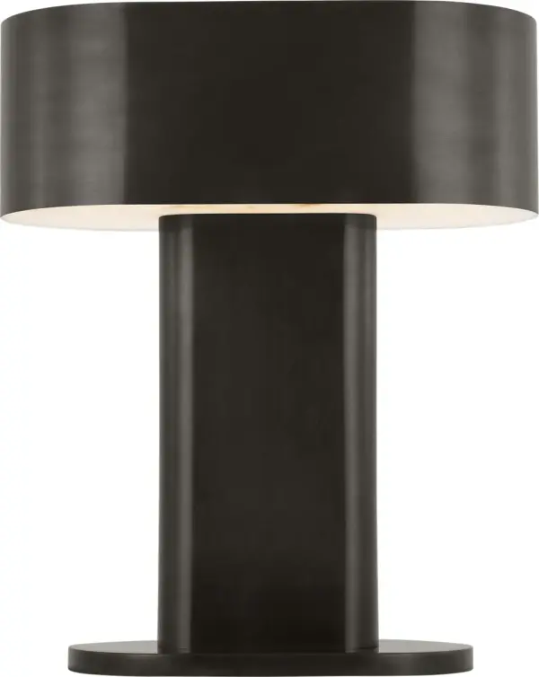 The Wyllis Medium Table Lamp combines refined dark bronze metalwork with high-quality 2700K LED lighting at 90 CRI for exceptional color rendering. Its transitional design bridges traditional and contemporary aesthetics.