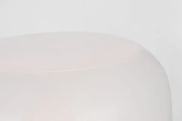 The Bolete Small Table Lamp combines Italian glassmaking tradition with modern LED technology. Its mushroom-inspired silhouette features seeded cream glass that creates an omnidirectional glow, while the 3-way dimmer offers versatile lighting control from soft ambiance to full illumination. - alternate view