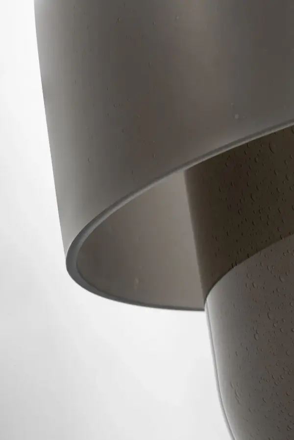 Kelly Wearstler's Bolete celebrates centuries-old Italian glassmaking with a modern mushroom-style silhouette. The seeded smoke glass shade and base create a warm, omnidirectional glow with integrated LED and 3-way dimming for versatile ambiance. - alternate view