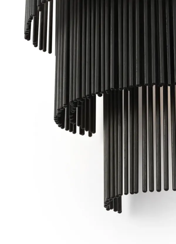 The Differo 8" Sconce combines architectural layering with an aged iron finish for a refined industrial aesthetic. Its compact 8-inch profile makes it ideal for hallways, bathrooms, and accent lighting applications. - alternate view