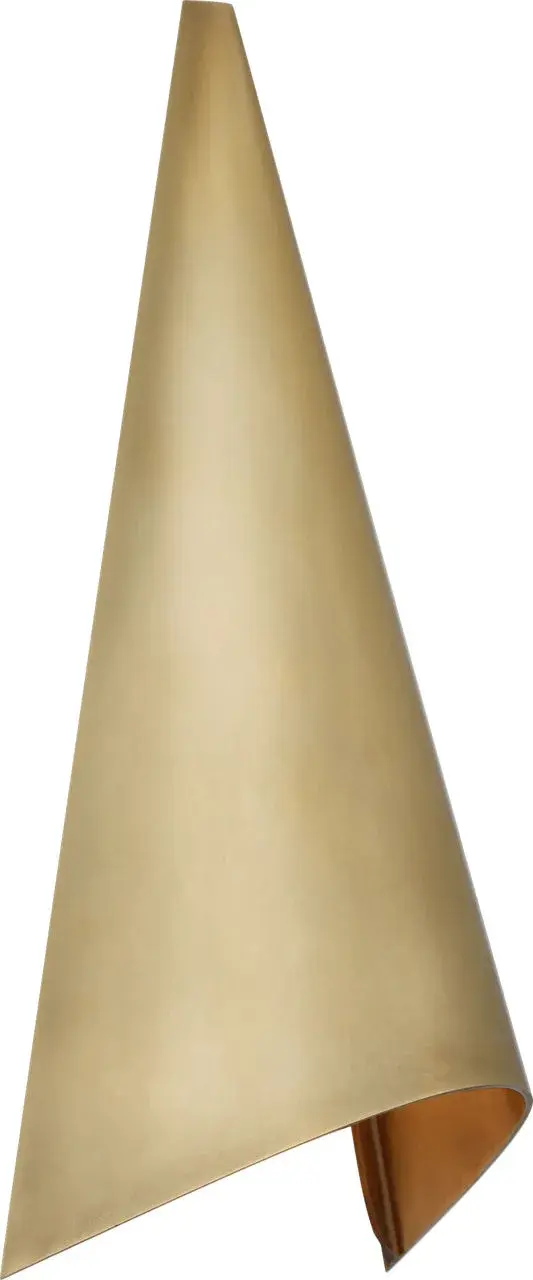 The Piel 9" Wall Wash combines contemporary design with practical versatility, featuring an antique-burnished brass finish that works beautifully both indoors and outdoors. Its compact size and wall wash lighting effect create ambient illumination perfect for highlighting architectural features or creating mood lighting in any space. - alternate view