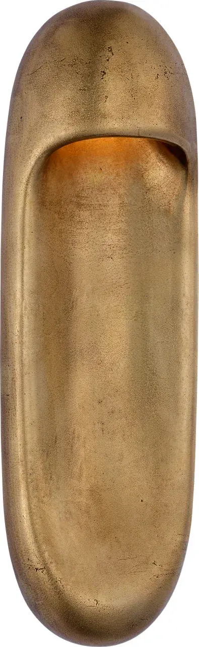 The Esculpa 18" wall light brings artistic sophistication with its elongated silhouette and museum-quality brass finish. Perfect for creating dramatic vertical interest in hallways, bathrooms, or flanking mirrors. - alternate view