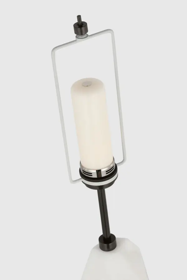 The Halcyon combines the timeless beauty of natural alabaster with modern cordless convenience. Its soft linen shade diffuses warm light perfectly for bedside reading or ambient accent lighting without cord clutter. - alternate view