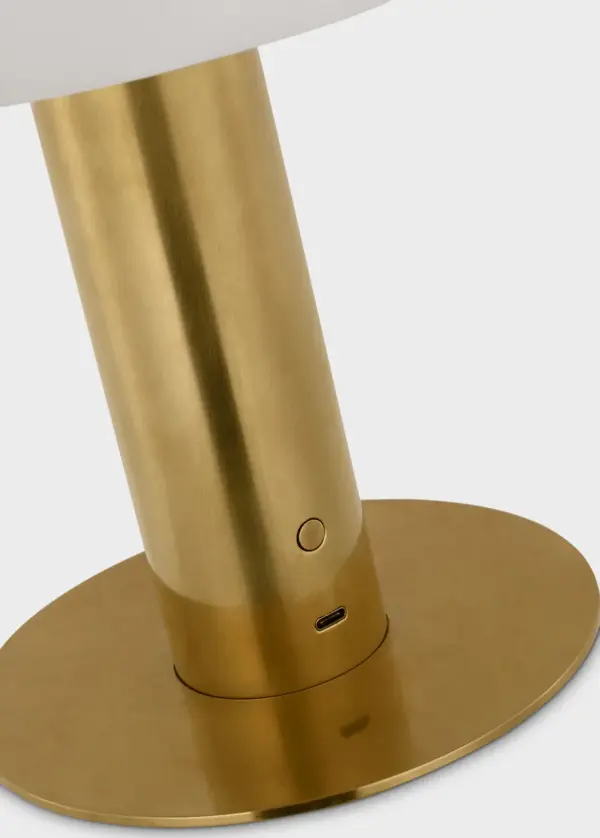 The Melange combines timeless brass craftsmanship with modern cordless convenience. Its compact 12" profile and natural alabaster shade deliver sophisticated ambient lighting perfect for bedside, desk, or accent placement. - alternate view